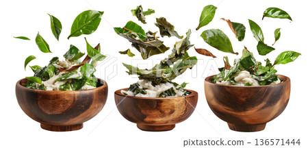 Rourou cooked taro leaves in creamy coconut milk, served in wooden bowl with garnishes, isolated on white background, Fiji cuisine Rourou cooked taro leaves in creamy coconut milk, served in wooden bowl with garnishes, isolated on white background, Fiji cuisine 136571444