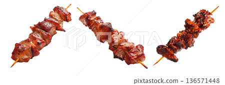 Anticuchos grilled beef meat skewer isolated on white transparent background, concept of South American barbecue cuisine Anticuchos grilled beef meat skewer isolated on white transparent background, concept of South American barbecue cuisine 136571448