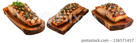 Grilled salmon steak topped with herbs and pepper, served on rustic wood board, isolated on white background, concept of seafood 136571457