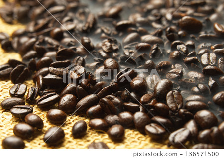 Freshly roasted coffee beans Freshly roasted coffee beans 136571500