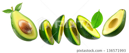 Whole and halved ripe avocados with green leaves, isolated on white background. Concept of fresh organic tropical fruit 136571993