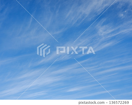 Sky and streaky clouds Sky and streaky clouds 136572269