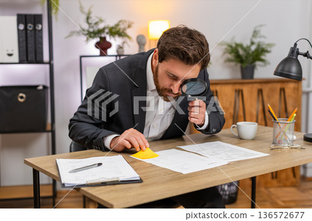 Middle-aged businessman analyst flags contract issue with magnifier shakes head no adds urgent label Middle-aged businessman analyst flags contract issue with magnifier shakes head no adds urgent label 136572677