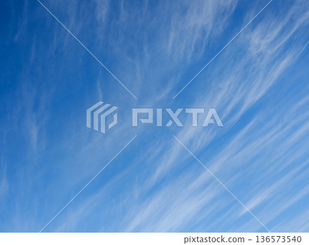 Sky and streaky clouds Sky and streaky clouds 136573540