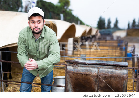 Portrait of farmer standing outdoors Portrait of farmer standing outdoors 136576644