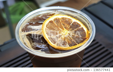 Black coffee mixed with lemon juice refreshing Black coffee mixed with lemon juice refreshing 136577441