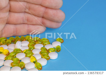 Hand Holding Pills And Capsules Hand Holding Pills And Capsules 136578317