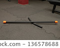 Balance training stick and foam rollers on gym floor 136578688
