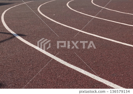 Sport floor. Interior of empty modern indoor sport court, coating Crumb rubber flooring, artificial. Sports surface with different marking lines. Recycled rubber Athletic field. Run track markup. 4K 136579134