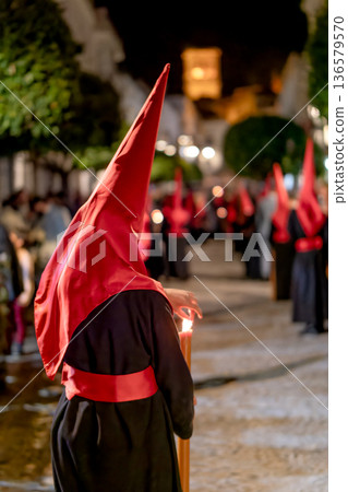 Back view of a nazareno in a holy week procession 136579570