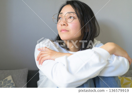 Portrait of a woman with glasses Portrait of a woman with glasses 136579919