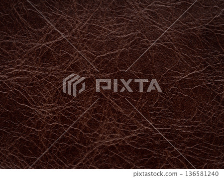 Brown leather natural texture, matte material, abstract background. Genuine quality empty pattern. Brown leather natural texture, matte material, abstract background. Genuine quality empty pattern. 136581240