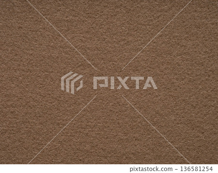 Dark beige blank felt texture closeup. Full frame retro, vintage pattern. Top view, layout, place for text. Textured pattern for shops with goods, creativity to illustrate patchwork master classes. 136581254