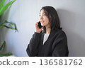 Japanese woman using a smartphone at home 136581762