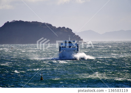 The Chita Peninsula sailing through rough seas and the car ferry "Shima Yuri" connecting the Chita Peninsula and remote islands. A scene of sailing on the sea in strong winds. The Chita Peninsula sailing through rough seas and the car ferry "Shima Yuri" connecting the Chita Peninsula and remote islands. A scene of sailing on the sea in strong winds. 136583119