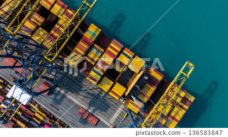 Aerial view Container cargo ship loading unloading container import export sea port, Global trade business container cargo ship freight shipping commercial trade logistic transportation international. Aerial view Container cargo ship loading unloading container import export sea port, Global trade business container cargo ship freight shipping commercial trade logistic transportation international. 136583847