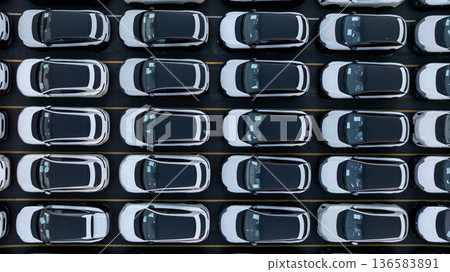 Aerial view car for sale stock lot row, Cars dealership inventory distribution automobile and automotive business, New cars parking for sale automobile automotive industry business. Aerial view car for sale stock lot row, Cars dealership inventory distribution automobile and automotive business, New cars parking for sale automobile automotive industry business. 136583891