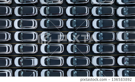 Aerial view car for sale stock lot row, Cars dealership inventory distribution automobile and automotive business, New cars parking for sale automobile automotive industry business. Aerial view car for sale stock lot row, Cars dealership inventory distribution automobile and automotive business, New cars parking for sale automobile automotive industry business. 136583892