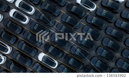 Aerial view car for sale stock lot row, Cars dealership inventory distribution automobile and automotive business, New cars parking for sale automobile automotive industry business. 136583902