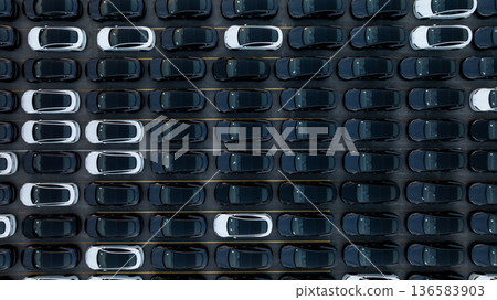 Aerial view car for sale stock lot row, Cars dealership inventory distribution automobile and automotive business, New cars parking for sale automobile automotive industry business. Aerial view car for sale stock lot row, Cars dealership inventory distribution automobile and automotive business, New cars parking for sale automobile automotive industry business. 136583903
