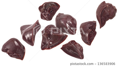 Falling raw chicken liver pieces isolated on white background with clipping path, full depth of field Falling raw chicken liver pieces isolated on white background with clipping path, full depth of field 136583906