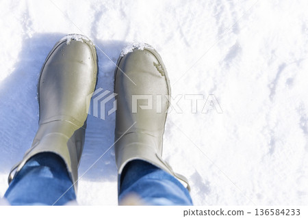 Snow and boots Snow and boots 136584233