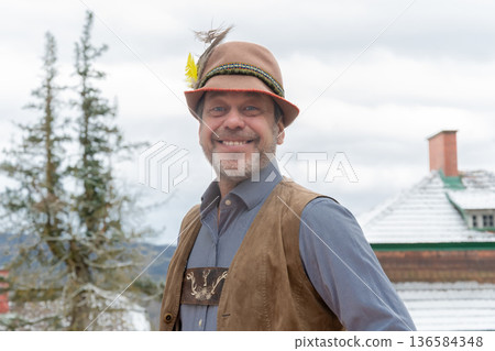Portrait of man in Bavarian clothing in winter Portrait of man in Bavarian clothing in winter 136584348