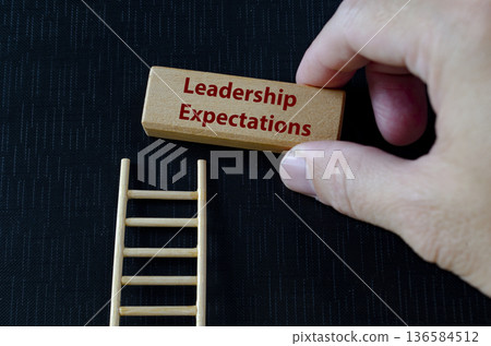 Leadership expectations text on wooden block representing accountability, standards, and performance elevation. Leadership expectations text on wooden block representing accountability, standards, and performance elevation. 136584512