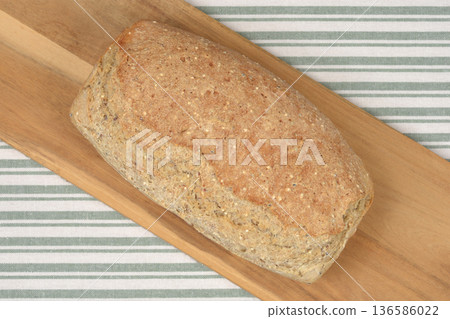 Healthy Homemade Quinoa Bread on a Wooden Board Healthy Homemade Quinoa Bread on a Wooden Board 136586022