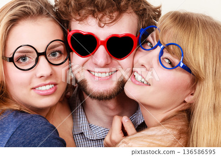 Happy friends man and women in glasses. 136586595