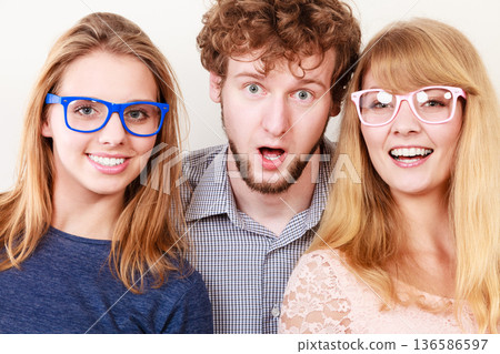 Happy friends man and women in glasses. 136586597