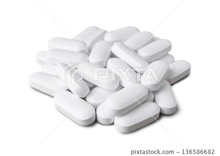 Pile of white tablets, medicine pill capsules, supplement, vitamin isolated on white background Pile of white tablets, medicine pill capsules, supplement, vitamin isolated on white background 136586682