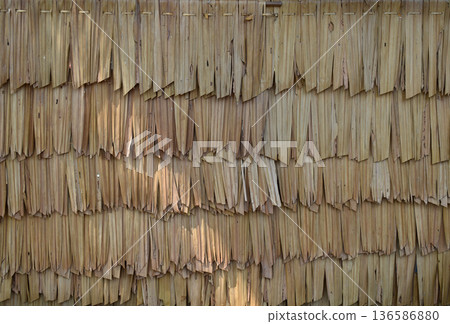 The wall texture made of brown dried palm leaf of a rural hut in Thailand, Wallpaper 136586880