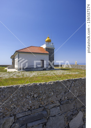 Cudillero lighthouse building by the Cantabrian Sea Cudillero lighthouse building by the Cantabrian Sea 136587574