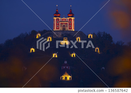 Calvary of Banska Stiavnica illuminated at cold twilight 136587642
