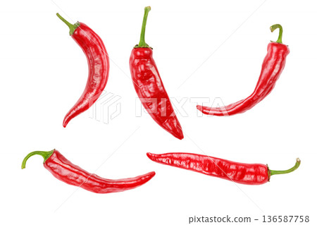 Five red hot chili peppers isolated on white background. 136587758