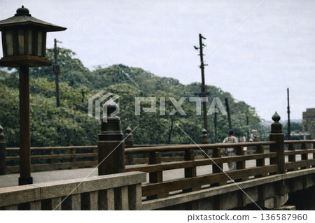 Vintage photo of Benkei Bridge in Akasaka-mitsuke, Tokyo, 1932 (black and white photo colorized using AI) 136587960