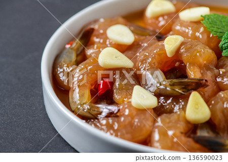Close-Up Korean Soy Marinated Shrimp or Saeu Jang with Garlic and Chili 136590023
