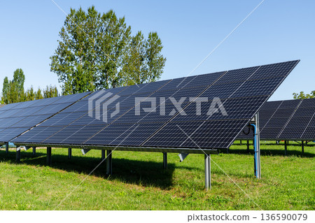 Solar panels installed on the ground 136590079