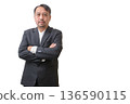 Confident Professional Leader with Arms Crossed on White Background 136590115