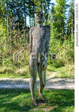 Kranzberg , Germany - May 01, 2025: Statue in the World Forest, Weltwald in Freising near Munich in Bavaria, Germany. Kranzberg , Germany - May 01, 2025: Statue in the World Forest, Weltwald in Freising near Munich in Bavaria, Germany. 136590176