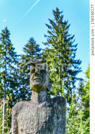 Kranzberg , Germany - May 01, 2025: Statue in the World Forest, Weltwald in Freising near Munich in Bavaria, Germany. 136590177