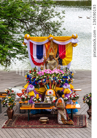 Munich, Germany - May 17, 2025: Monks and groups of Buddhist communities at the vesakh festival in Munich, Germany Munich, Germany - May 17, 2025: Monks and groups of Buddhist communities at the vesakh festival in Munich, Germany 136590193