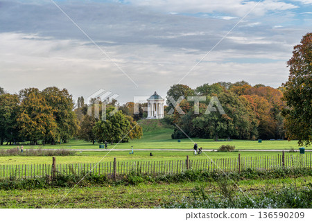 Munich, Germany - Oct 14, 2025: Monopteros - Greek style temple in Englischer Garten. Munich, Germany Munich, Germany - Oct 14, 2025: Monopteros - Greek style temple in Englischer Garten. Munich, Germany 136590209