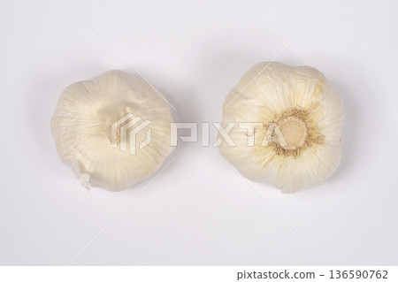 Two Fresh Garlic Bulbs on White Background Two Fresh Garlic Bulbs on White Background 136590762