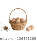 Fresh Eggs Placed in a Woven Basket With Straw on a Bright Background 136591269