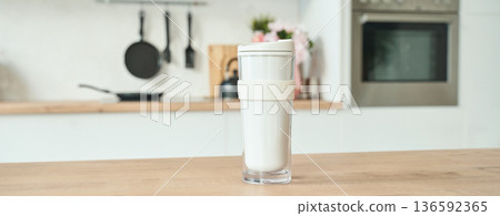 Modern kitchen with cutting-edge blender for efficient home cooking Modern kitchen with cutting-edge blender for efficient home cooking 136592365