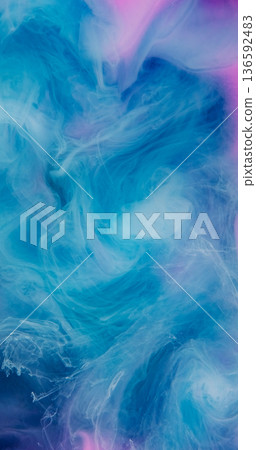 Ink drop splash. Smog water texture. Defocused blue pink purple color bright liquid acrylic pigment cloud fog on abstract background. Ink drop splash. Smog water texture. Defocused blue pink purple color bright liquid acrylic pigment cloud fog on abstract background. 136592483