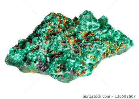Vibrant green malachite crystal specimen with rich banding patterns isolated on white background Vibrant green malachite crystal specimen with rich banding patterns isolated on white background 136592607