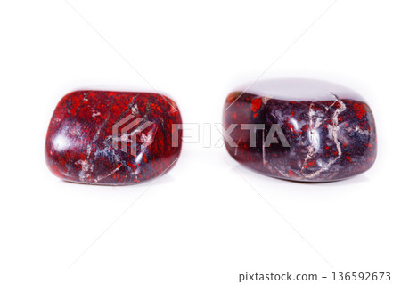Macro mineral stone jasper hematite on white background Macro mineral stone jasper hematite on white background 136592673